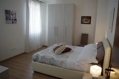 Letto o letti in una camera di Alla Torre B&B