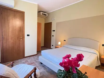 Letto o letti in una camera di Agriturismo Taglio del Re