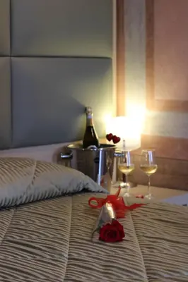 Letto o letti in una camera di Hotel Villa Maternini