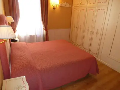 Letto o letti in una camera di Casa Burchielle