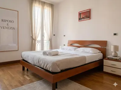 Letto o letti in una camera di Central Apartment