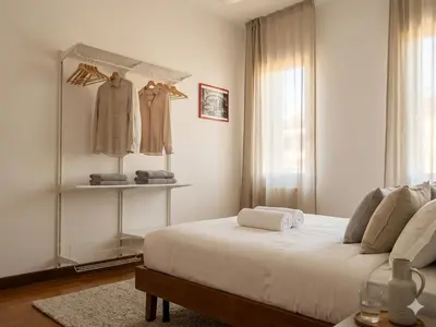 Letto o letti in una camera di Central Apartment