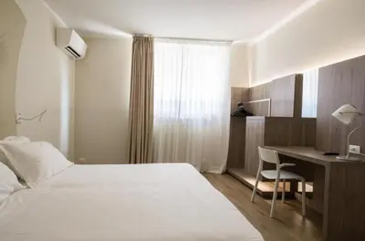 Letto o letti in una camera di M14 Hotel & Spa