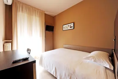 Letto o letti in una camera di M14 Hotel & Spa