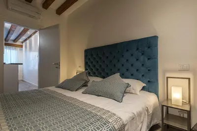 Letto o letti in una camera di La Loggia della Luna