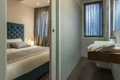 Letto o letti in una camera di La Loggia della Luna