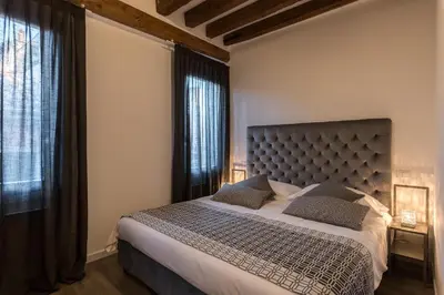 Letto o letti in una camera di La Loggia della Luna