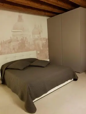 Letto o letti in una camera di Gioiello di Venezia, Suite San Lio