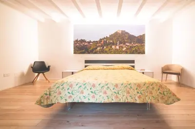 Letto o letti in una camera di Col Delle Rane