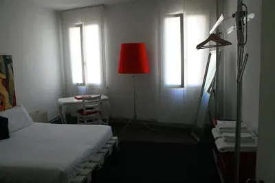 Letto o letti in una camera di 19 Borgo Cavour