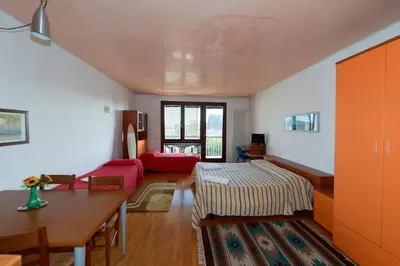 Letto o letti in una camera di Antares Apartments