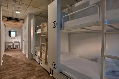 Letto o letti in una camera di Anda Venice Hostel