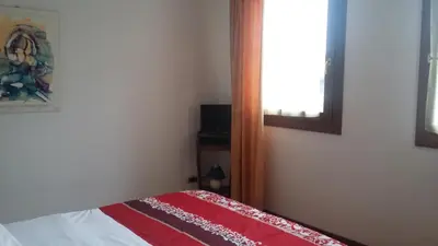 Letto o letti in una camera di alloggi Alba 1