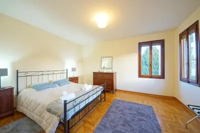 Letto o letti in una camera di Treviso Casa Magnolie wi-fi