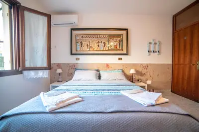 Letto o letti in una camera di B&B LELLA