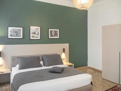 Letto o letti in una camera di Grand Canal Suite by Wonderful Italy