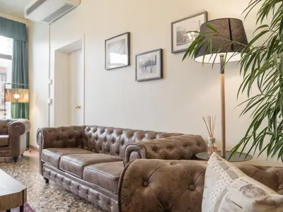 Area soggiorno di Grand Canal Suite by Wonderful Italy