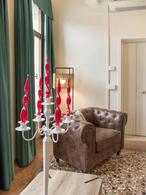 Area soggiorno di Grand Canal Suite by Wonderful Italy