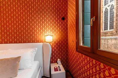 Letto o letti in una camera di Ca' Morosini