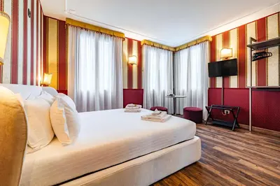 Letto o letti in una camera di Ca' Morosini
