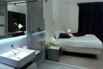 Letto o letti in una camera di Hotel Lugano Torretta