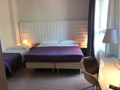 Letto o letti in una camera di Hotel Lugano Torretta
