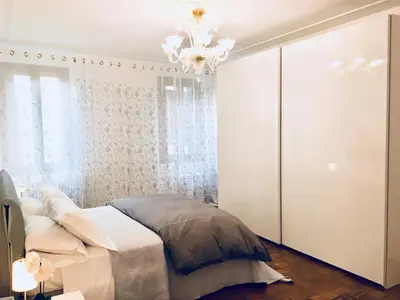 Letto o letti in una camera di Central Apartment