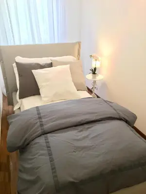 Letto o letti in una camera di Central Apartment