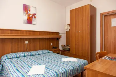 Letto o letti in una camera di Hotel Taormina