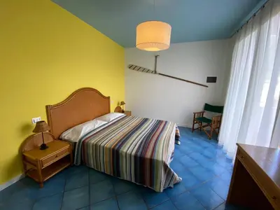 Letto o letti in una camera di Residence Ambra