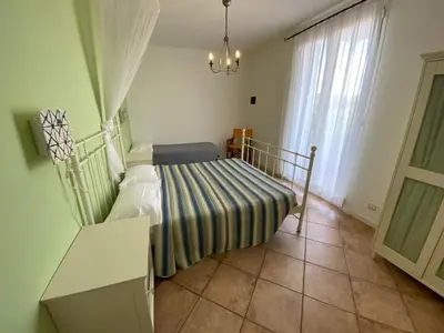 Letto o letti in una camera di Residence Ambra
