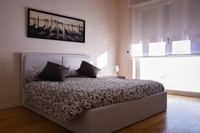 Letto o letti in una camera di 4YOU APARTMENTS - PONTI ROMANI