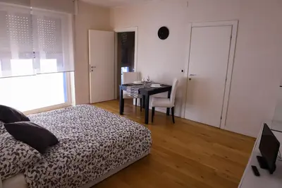 Letto o letti in una camera di 4YOU APARTMENTS - PONTI ROMANI