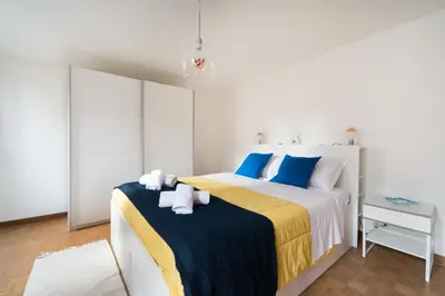 Letto o letti in una camera di Ca' alla Colombina by Sarlux