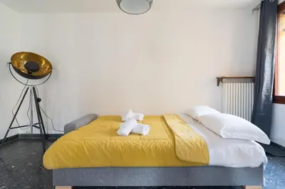 Letto o letti in una camera di Ca' alla Colombina by Sarlux