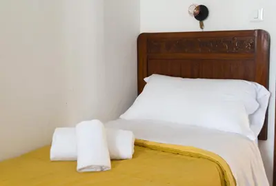 Letto o letti in una camera di Ca' alla Colombina by Sarlux
