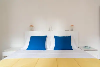 Letto o letti in una camera di Ca' alla Colombina by Sarlux