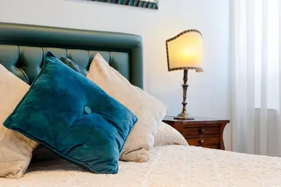 Letto o letti in una camera di Ca' Santo Spirito B&B