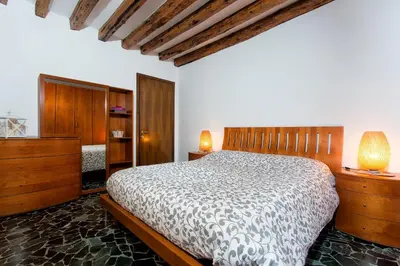 Letto o letti in una camera di Ca’Lisa