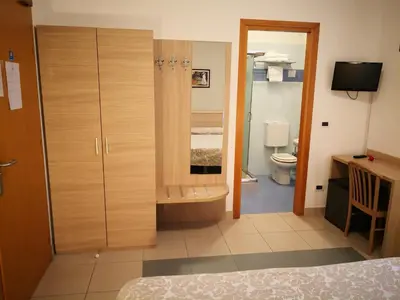 Letto o letti in una camera di Domus Ciliota