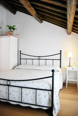Letto o letti in una camera di Burro e Marmellata