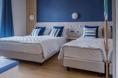 Letto o letti in una camera di Hotel Galassia Suites & Spa