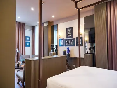 Letto o letti in una camera di The Glam Boutique Hotel & Apt