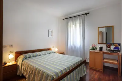 Letto o letti in una camera di Albergo Volpara