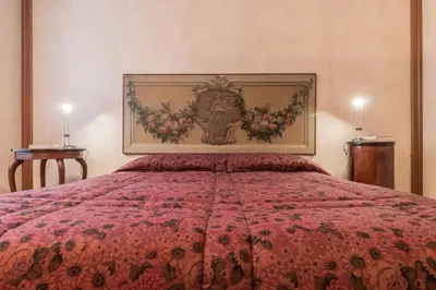 Letto o letti in una camera di Fenice Double Canal view by LionHost
