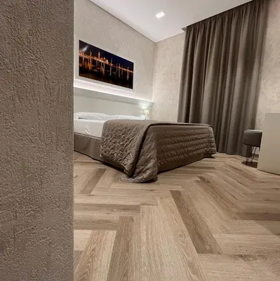 Letto o letti in una camera di Hotel Poppi
