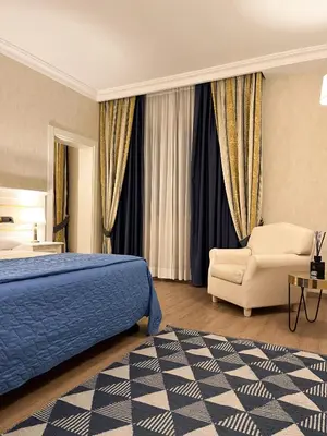 Letto o letti in una camera di Hotel Poppi