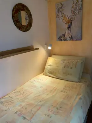Letto o letti in una camera di Bed and Room Al Fiume Piovego