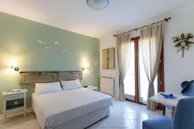Letto o letti in una camera di B&B A Casa di Marta