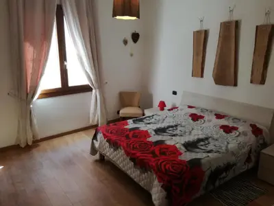 Letto o letti in una camera di Domus Quietis